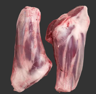 Load image into Gallery viewer, Two raw meat bones on a white background