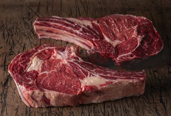Load image into Gallery viewer, 21 Day Aged Tomahawk Steaks
